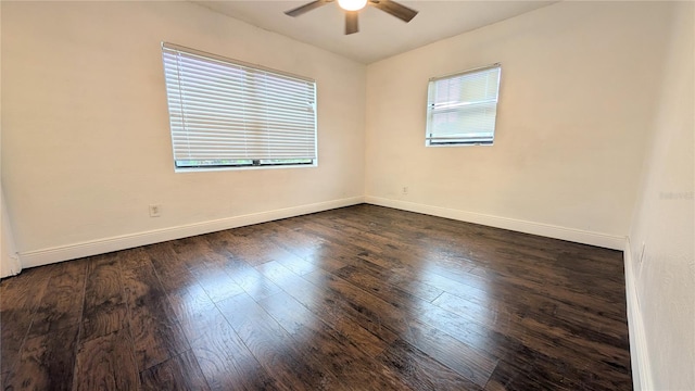 unfurnished room featuring ceiling fan and dark hardwood / wood-style flooring