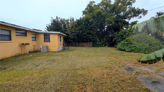 view of yard with central AC