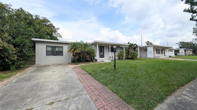 single story home with a front lawn