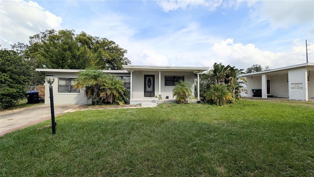 single story home with a front yard