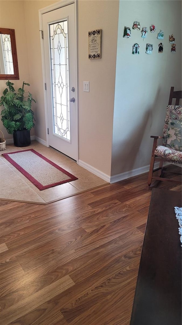 foyer featuring dark hardwood / wood-style floors