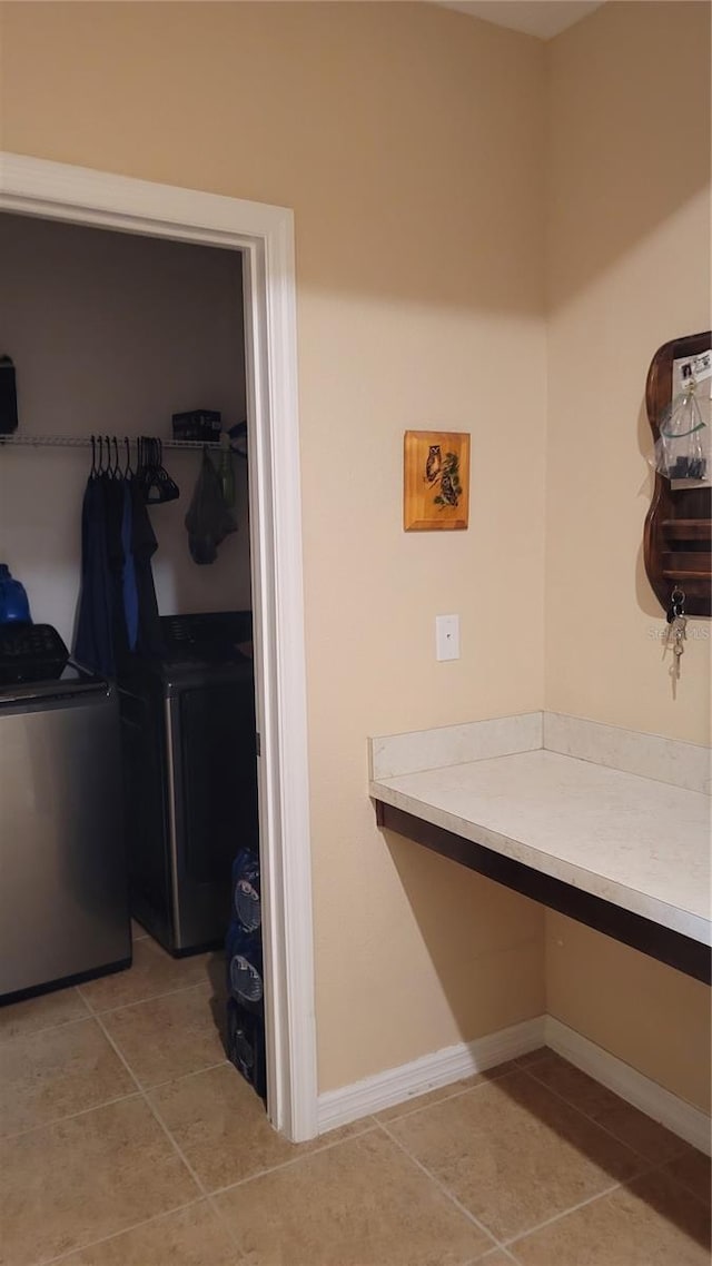 bathroom with tile patterned floors