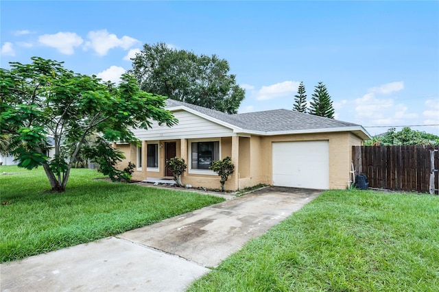 ranch-style home with a garage and a front lawn