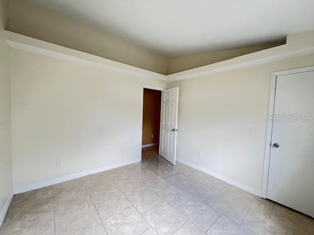 view of tiled spare room