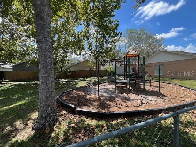 view of jungle gym featuring a yard