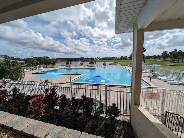 view of pool featuring a patio