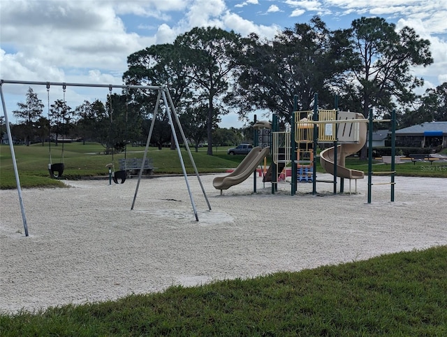 view of jungle gym with a yard