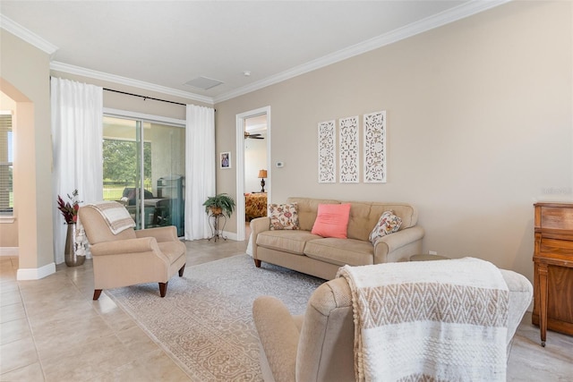 tiled living room featuring ornamental molding