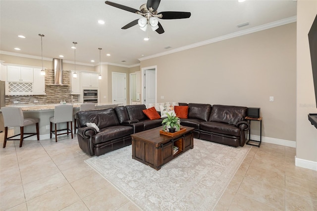 living room featuring ornamental molding and light tile patterned floors