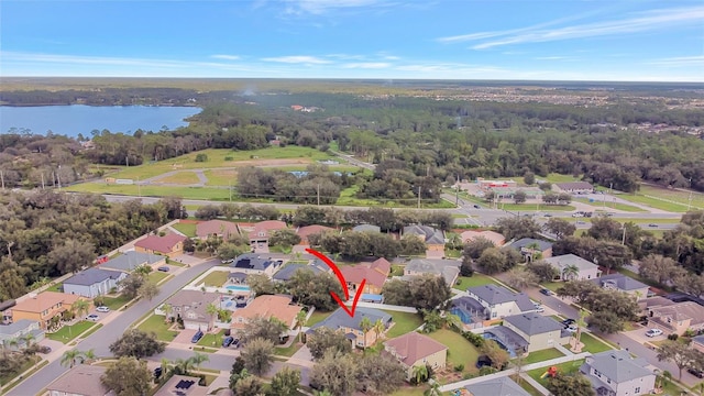 birds eye view of property featuring a water view