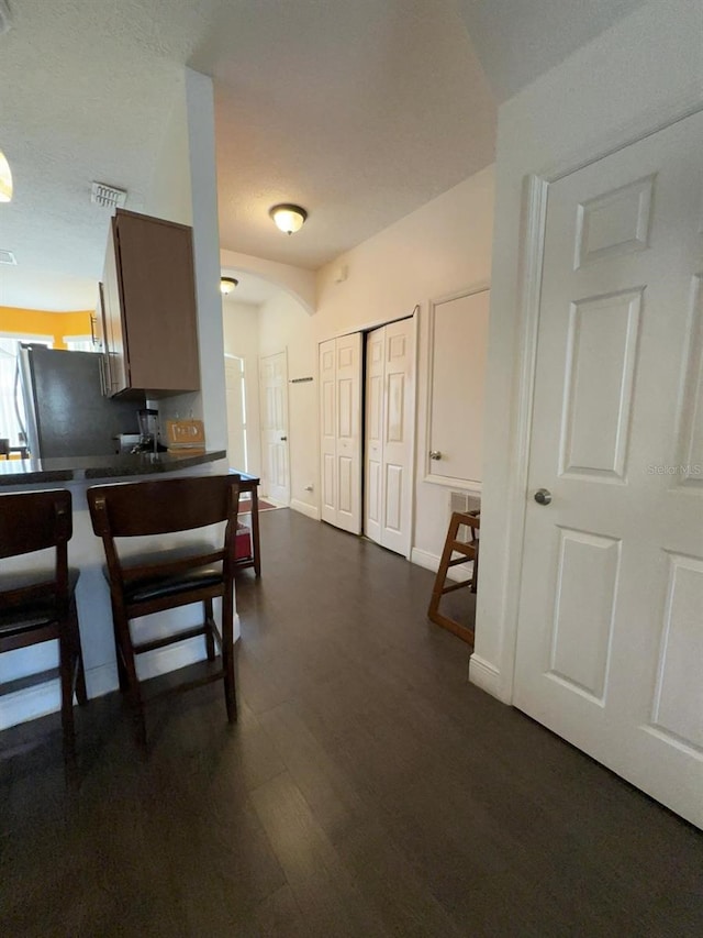 kitchen featuring stainless steel refrigerator