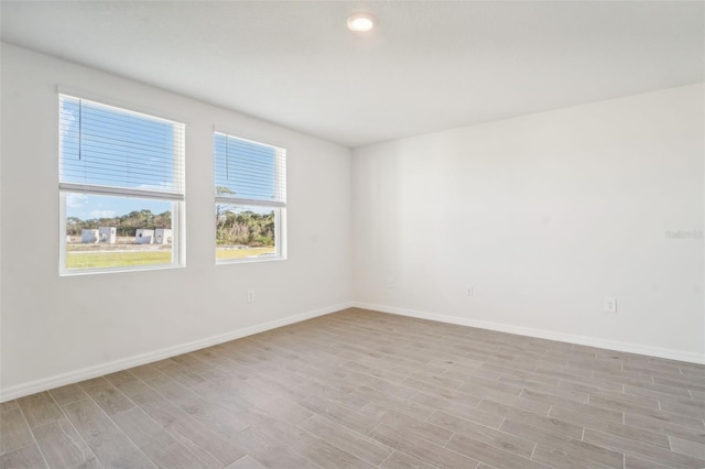 empty room featuring light hardwood / wood-style flooring