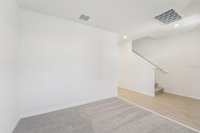 unfurnished room with light hardwood / wood-style floors