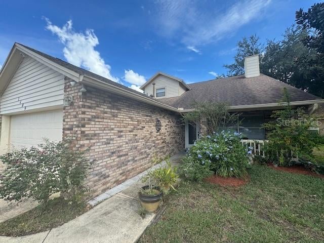 single story home with a garage