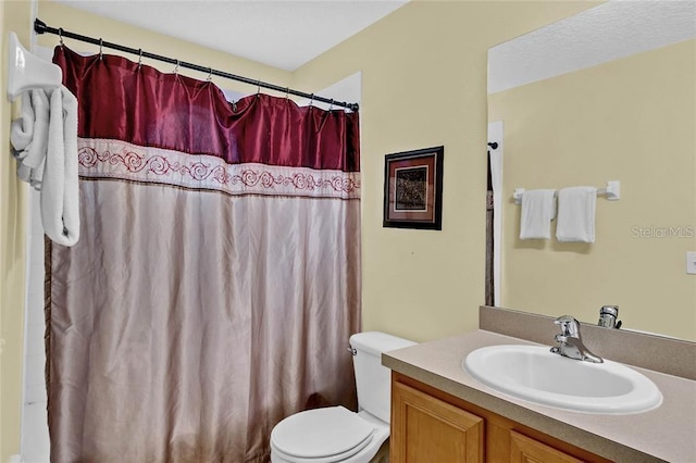 full bathroom with shower / bath combination with curtain, vanity, and toilet