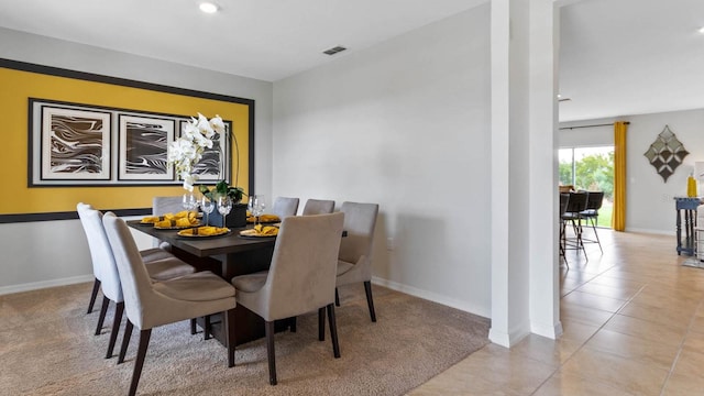 view of tiled dining space