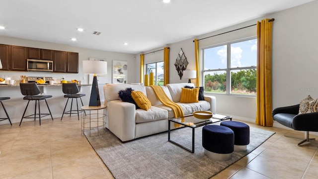 living room featuring light tile patterned floors