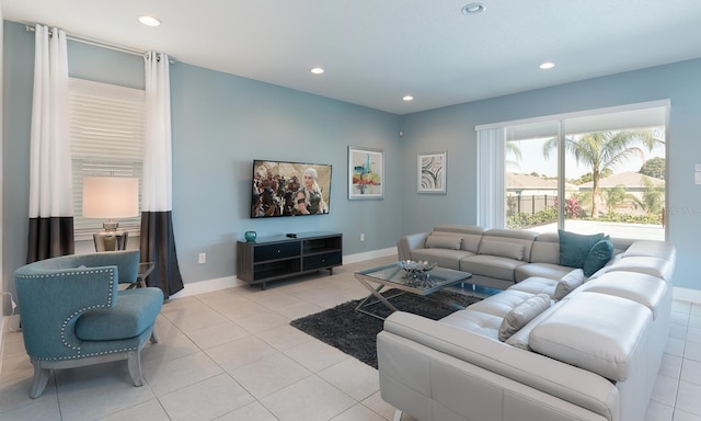 living room with light tile patterned floors