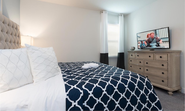 bedroom featuring carpet