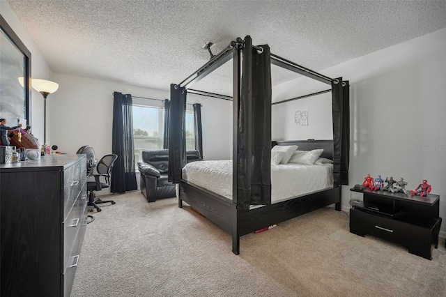 carpeted bedroom with a textured ceiling