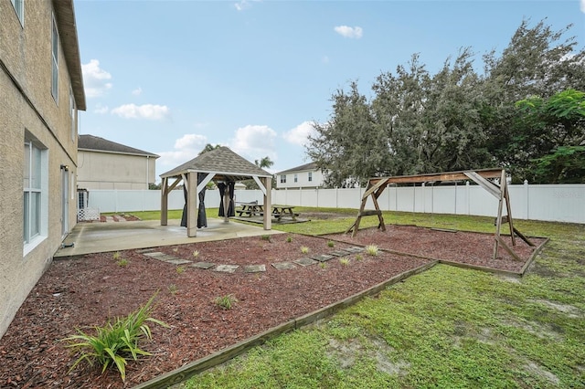 view of yard featuring a gazebo and a patio