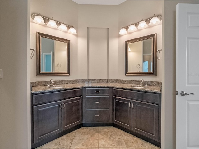 bathroom with vanity and tile patterned flooring