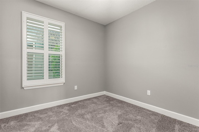 3951 Carrick Bend Dr, Kissimmee, FL 34746 - unfurnished room with baseboards and carpet