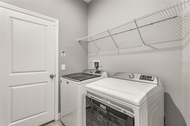 3951 Carrick Bend Dr, Kissimmee, FL 34746 - laundry area featuring washer and dryer and laundry area