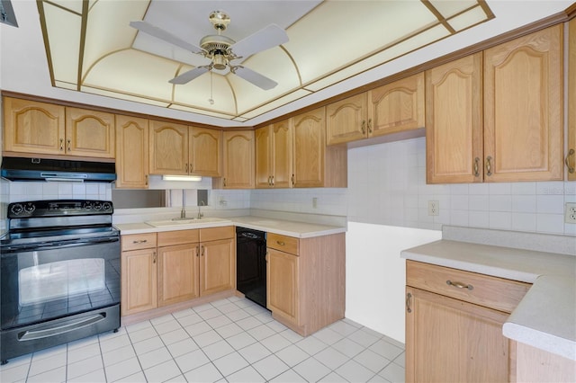 kitchen with tasteful backsplash, black appliances, sink, and ceiling fan