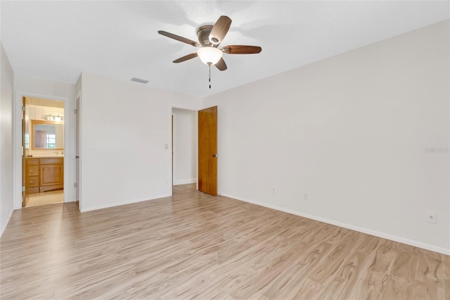 unfurnished room with light hardwood / wood-style floors and ceiling fan