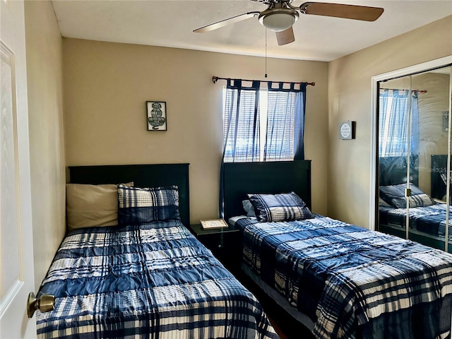 bedroom featuring a closet and ceiling fan