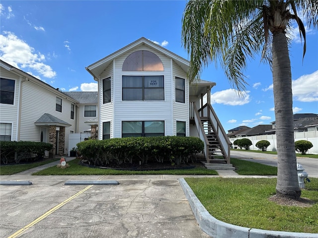 view of front of property with a front lawn