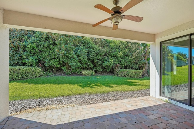 view of patio featuring ceiling fan