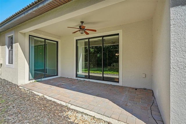 view of patio with ceiling fan