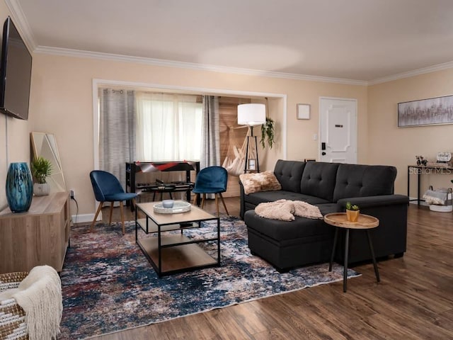 living room with dark wood-type flooring and crown molding