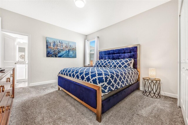 4782 Kings Castle Cir, Kissimmee, FL 34746 - bedroom featuring carpet, baseboards, and connected bathroom