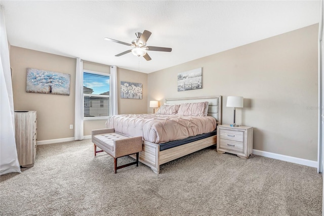 bedroom featuring light carpet and ceiling fan