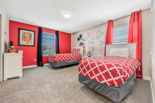 carpeted bedroom with a textured ceiling