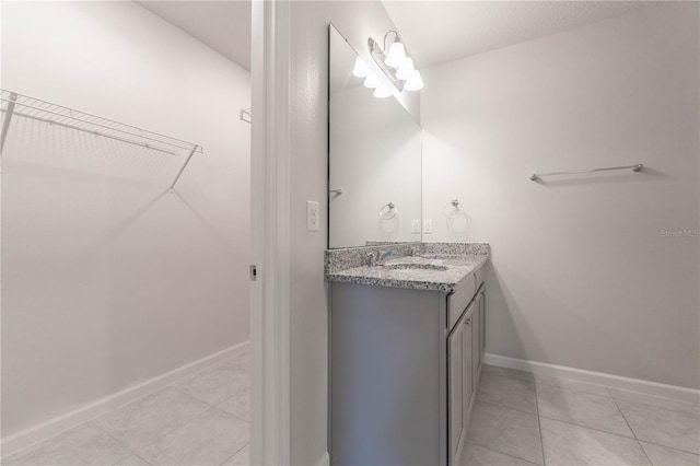 bathroom featuring vanity and tile patterned flooring