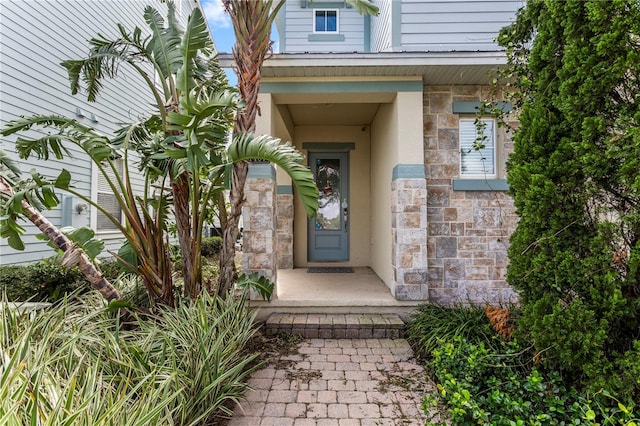 1407 Fairview Cir, Reunion, FL 34747 - entrance to property with stone siding and stucco siding