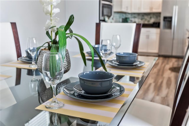 1407 Fairview Cir, Reunion, FL 34747 - dining room featuring wood finished floors