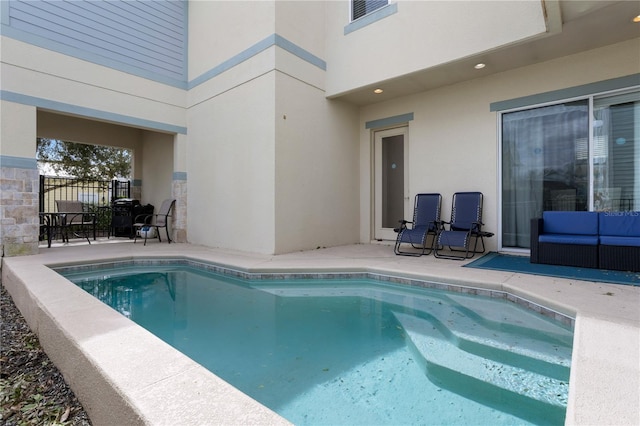 view of pool with a patio