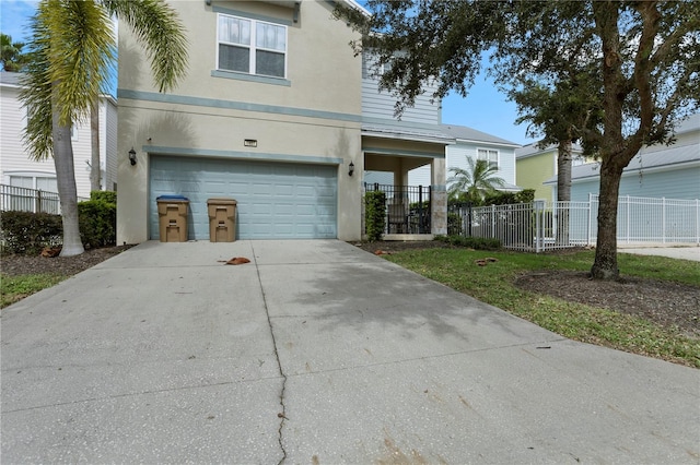 view of front of property featuring a garage