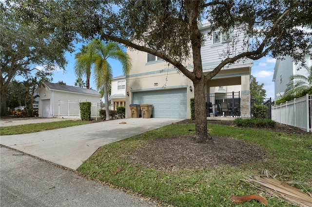 1407 Fairview Cir, Reunion, FL 34747 - traditional-style home with stucco siding, a garage, fence, and concrete driveway