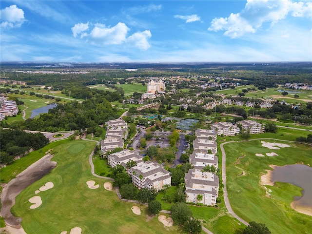 1407 Fairview Cir, Reunion, FL 34747 - drone / aerial view featuring view of golf course and a water view