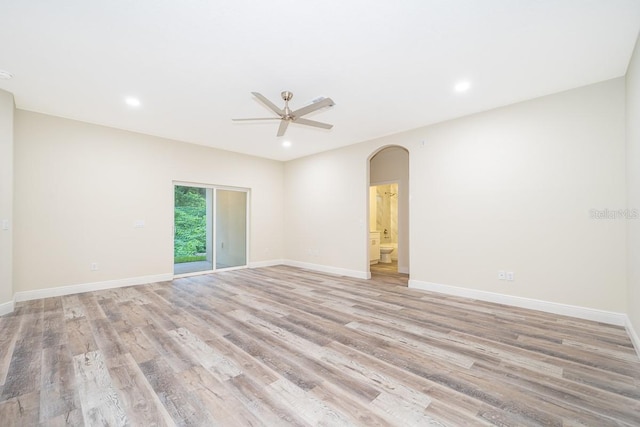 unfurnished room with ceiling fan and light hardwood / wood-style floors