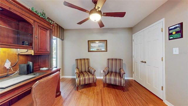 office area featuring light wood-type flooring and ceiling fan