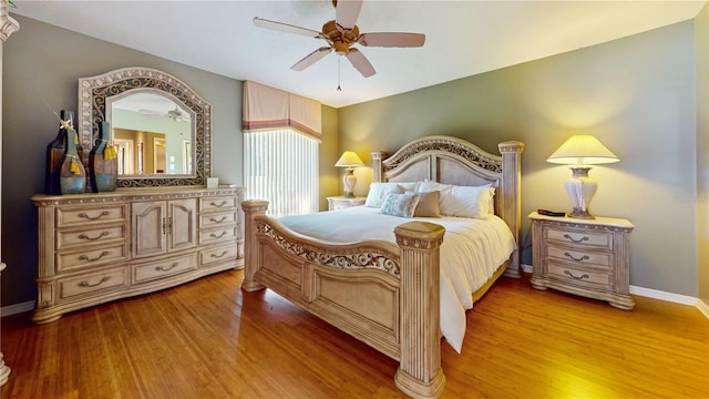 bedroom featuring light wood-type flooring and ceiling fan