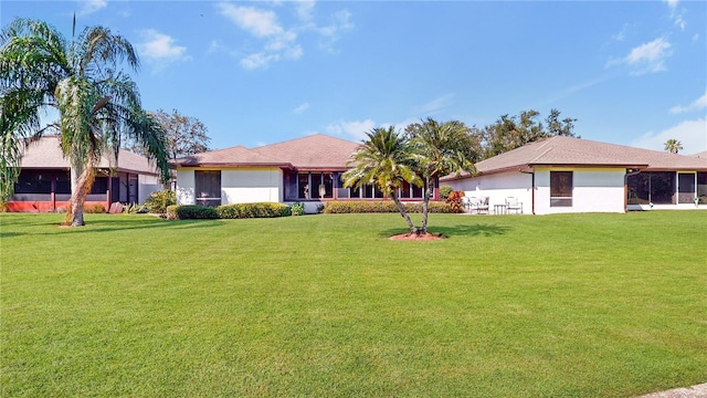 single story home with a front yard