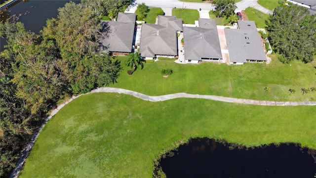 drone / aerial view with a water view